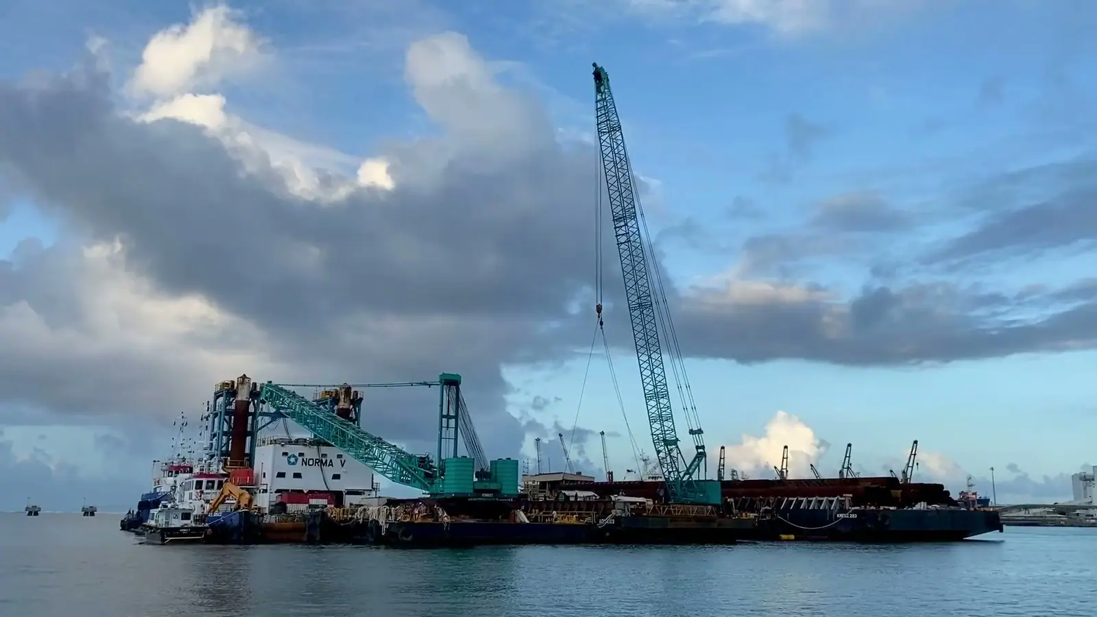 Floating crane barge on open water