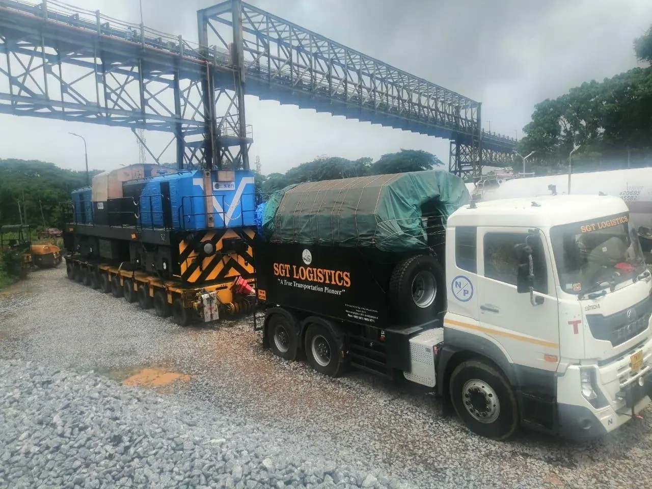 Locomotives loaded on multi-axle trailers for an over-dimensional move