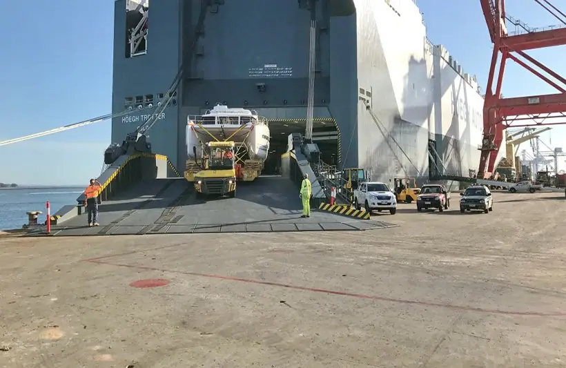 Wheeled cargo driven up the stern ramp of a Ro-Ro vessel